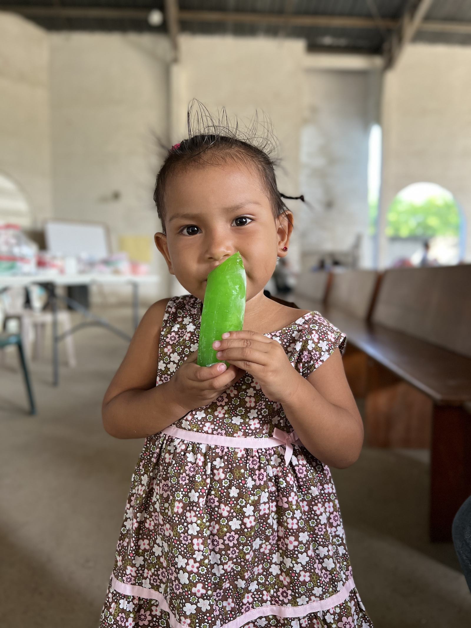 little girl with green thing aleluya