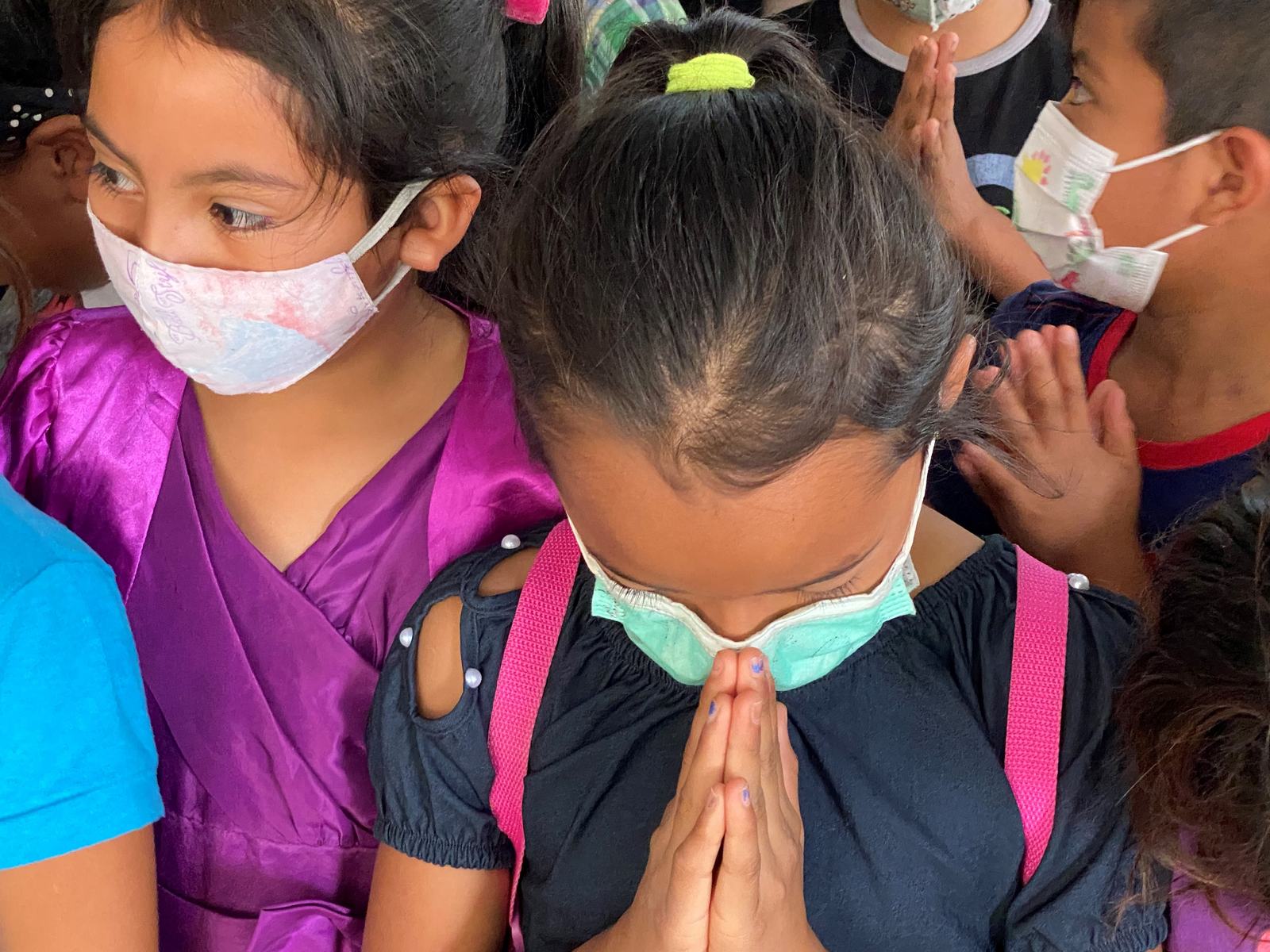 Happy Tummies kids praying