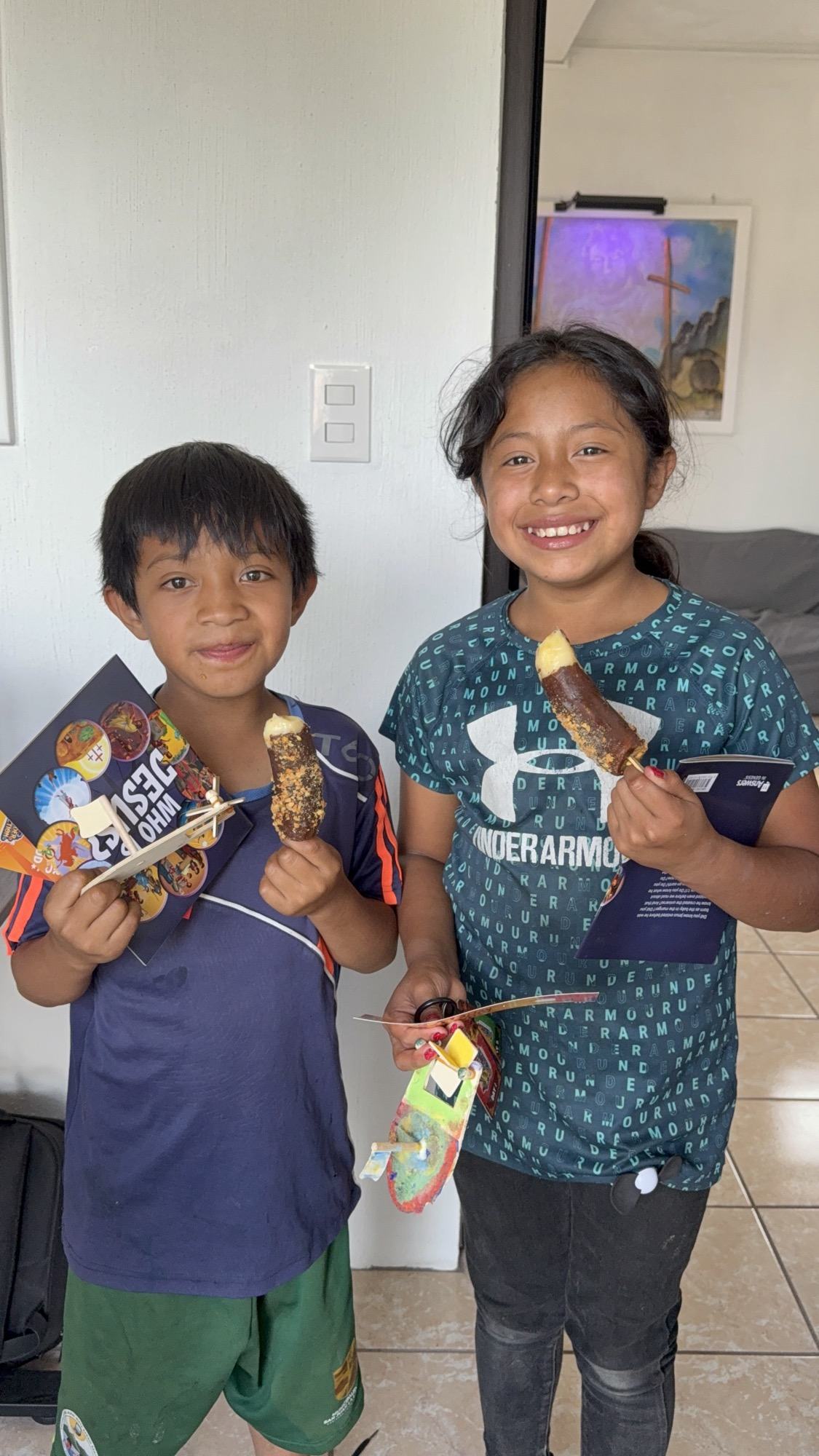 July 2026 children with crafts and treats aleluya